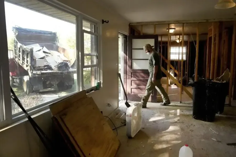 A house stripped to the studs after storm water got inside